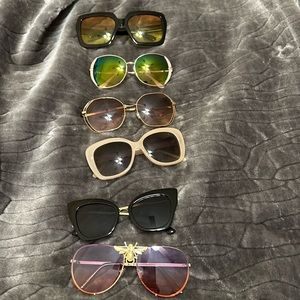 Six pair of sunglasses